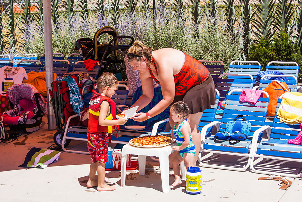 Mom & Kids Enjoying Pizza